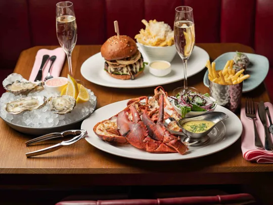 Burger And Lobster Food On Table