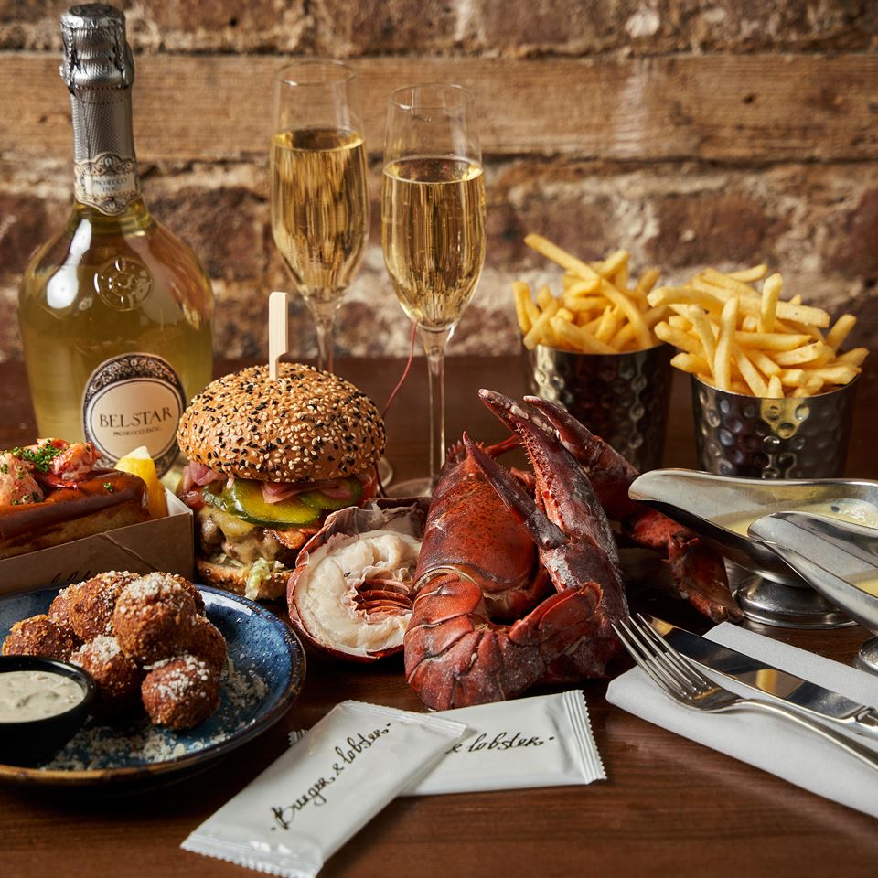 Burger and Lobster food on a table